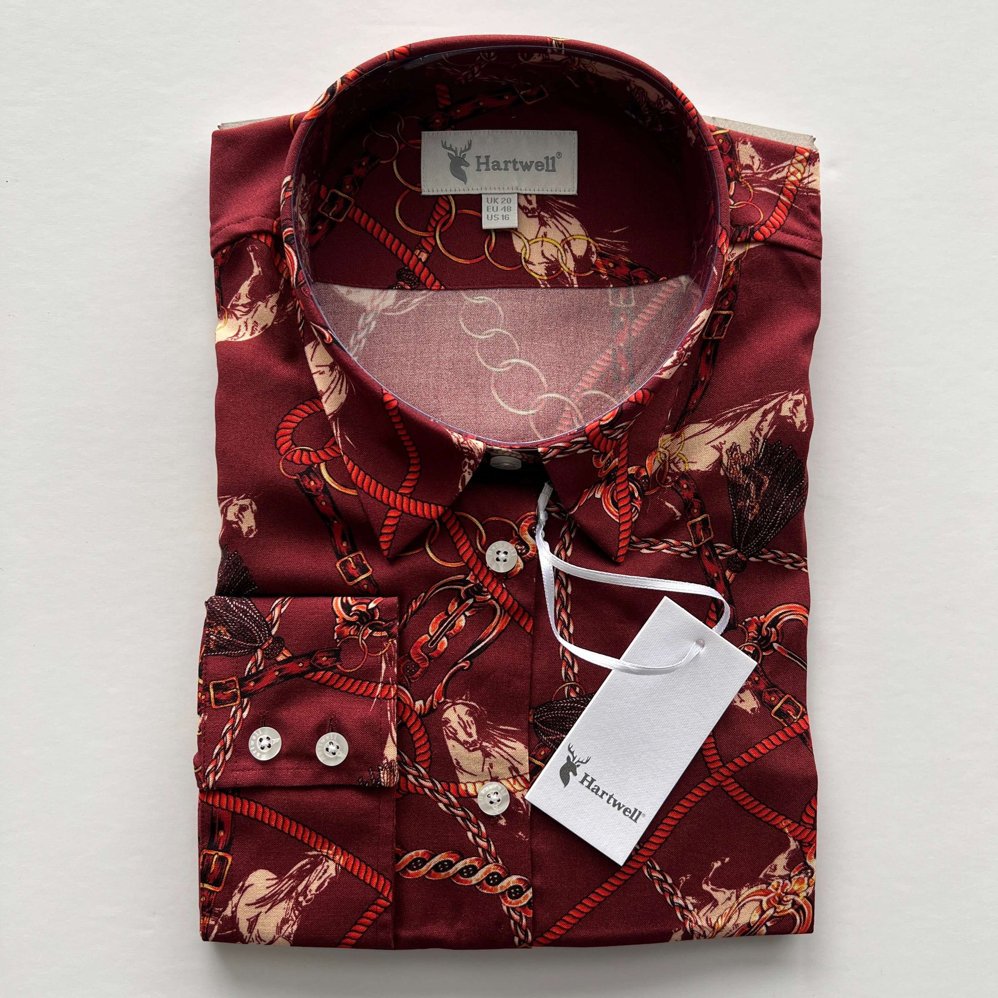 Folded cherry red Hartwell equestrian shirt