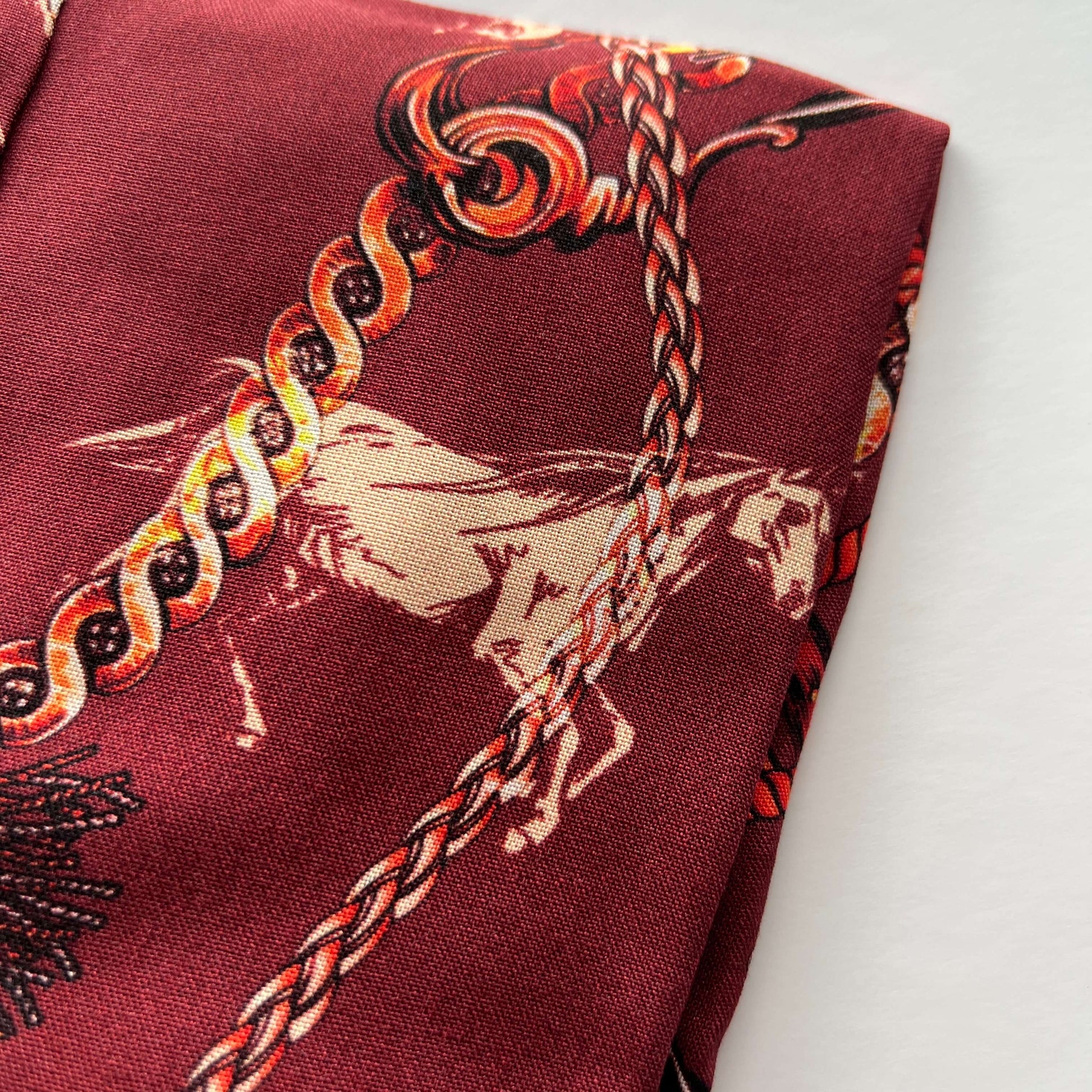 close-up of Hartwell cherry red equestrian shirt