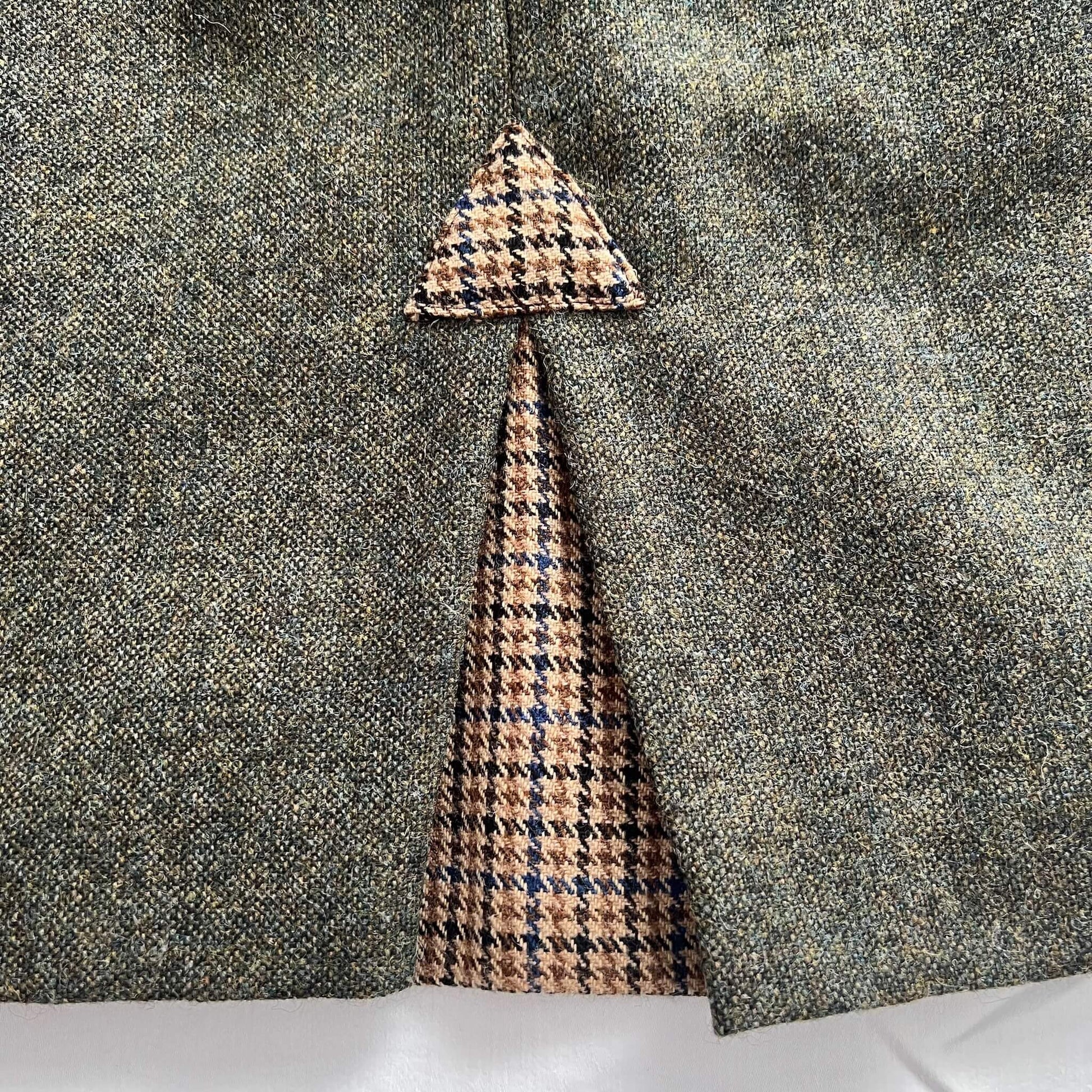 adderbury green tweed skirt rear pleat detail