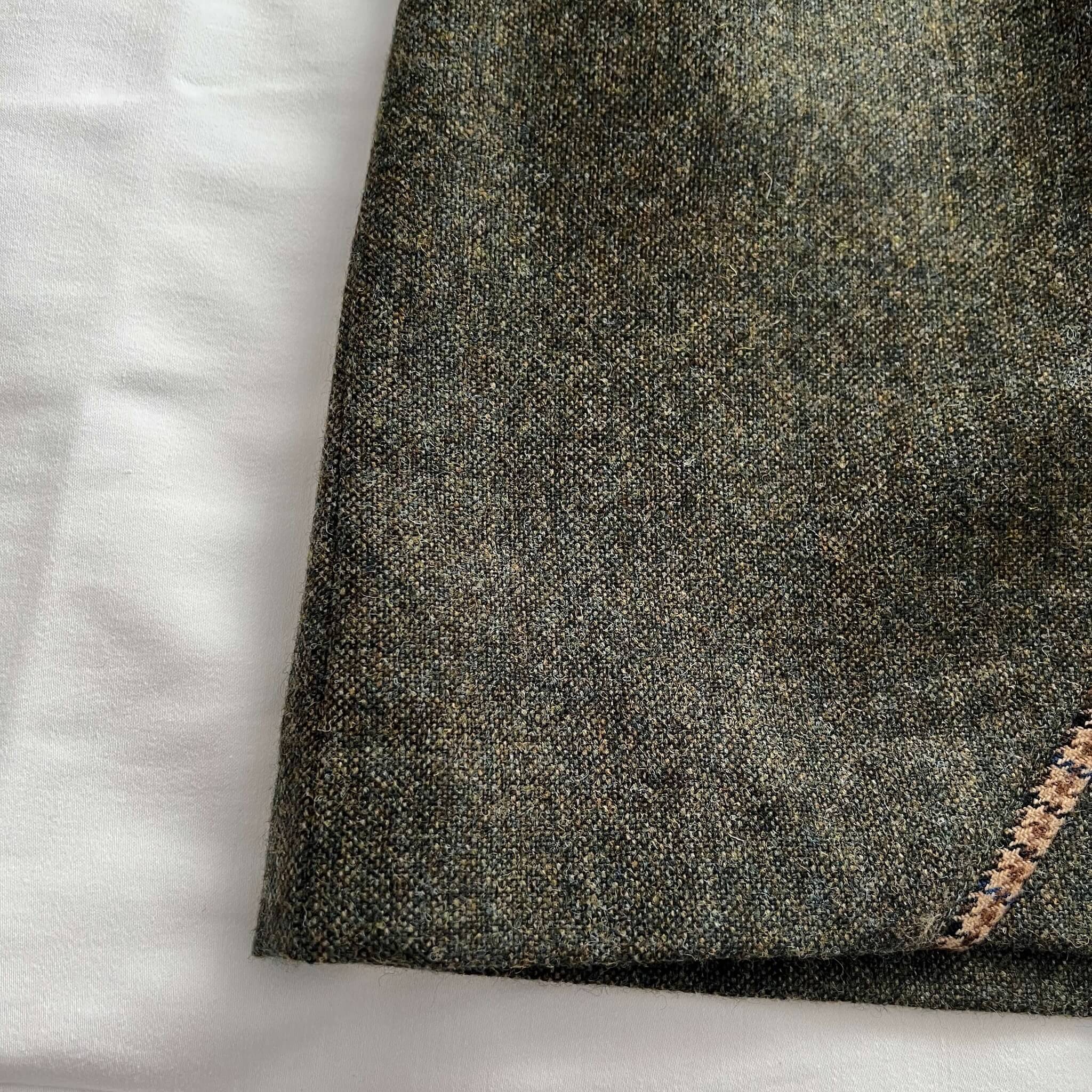 close up of adderbury green tweed skirt