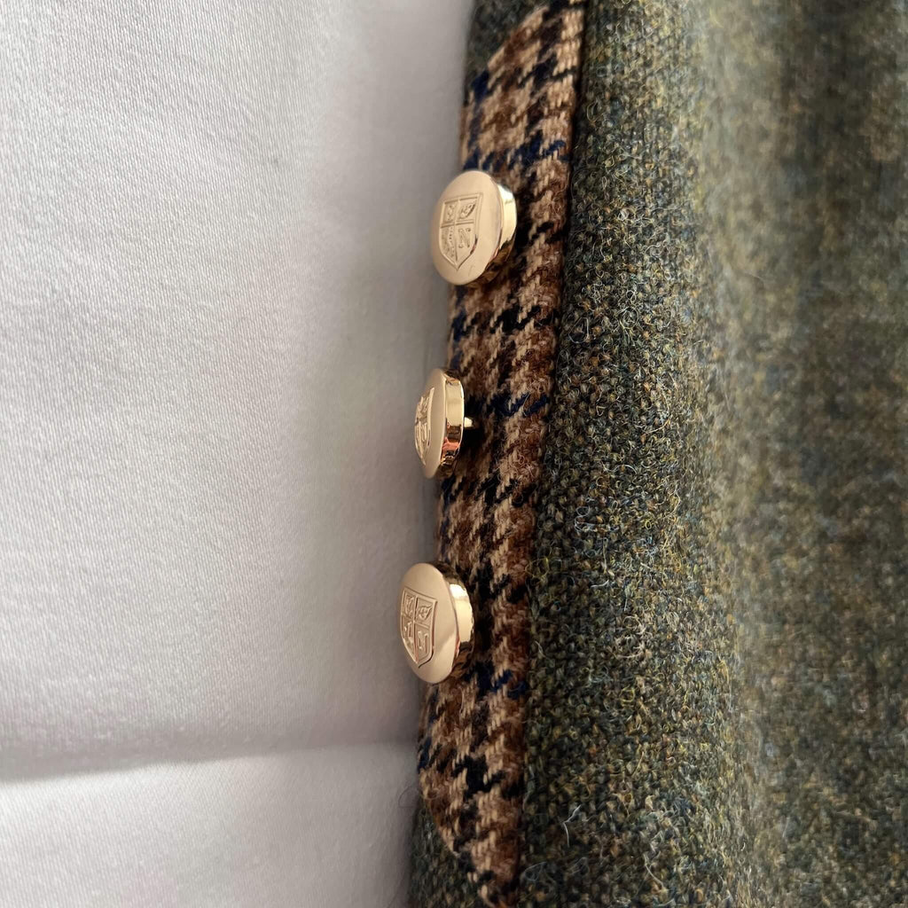 close up of side detail green tweed skirt