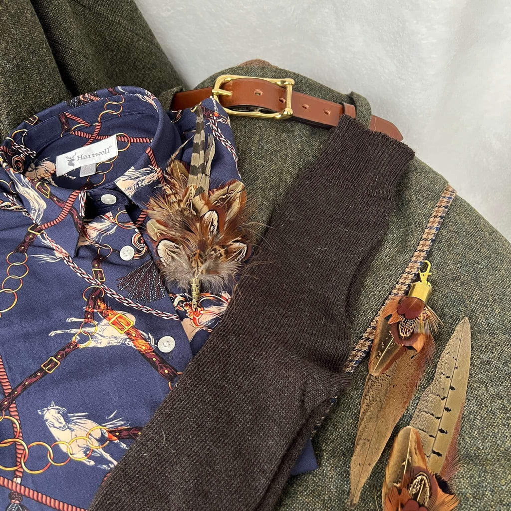 autumn country outfit featuring feather boot tassels, tweed skirt, feather brooch pin and alpaca wool socks