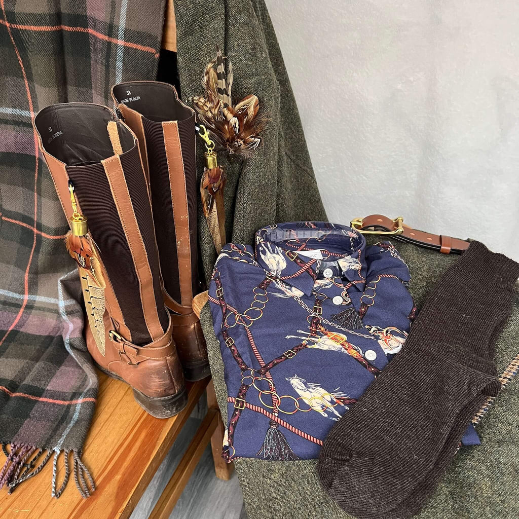 autumn country outfit featuring feather boot tassels, tweed skirt, feather brooch pin and alpaca wool socks