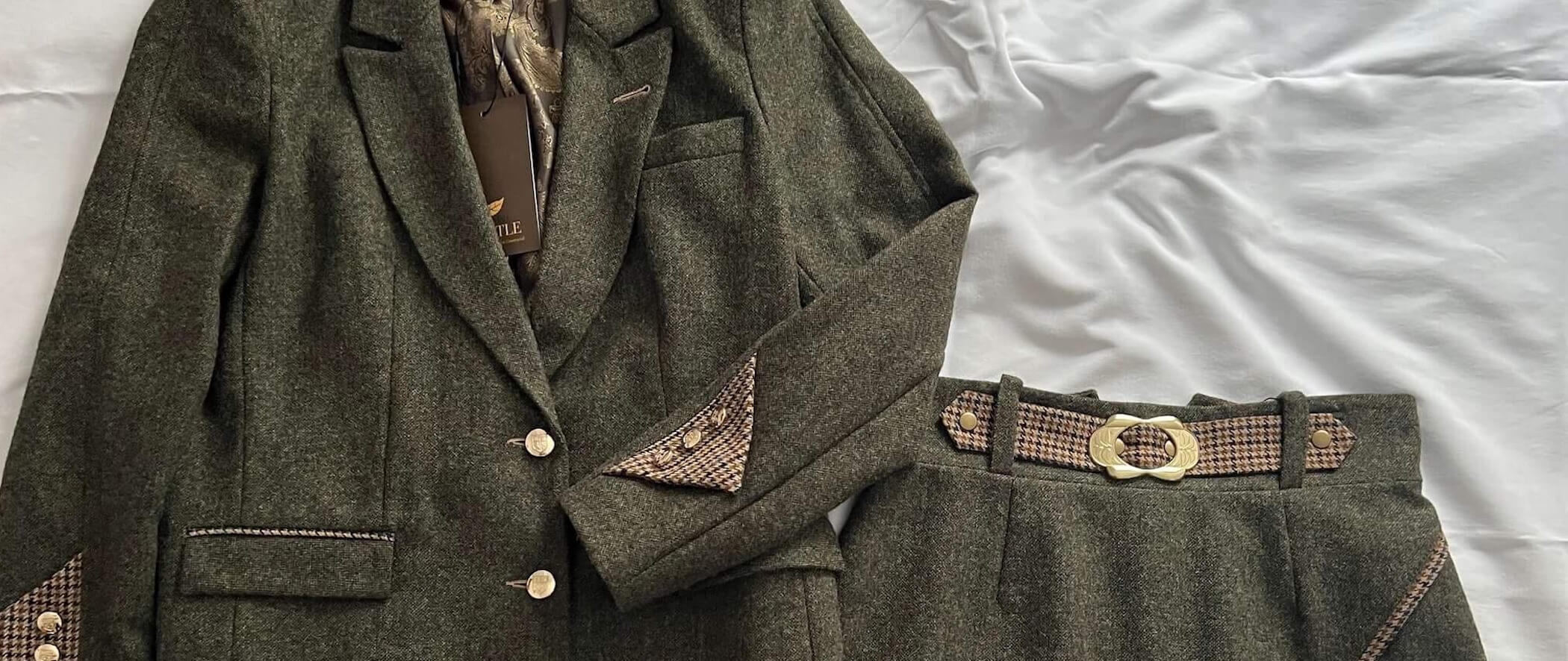 green tweed jacket and green tweed skirt