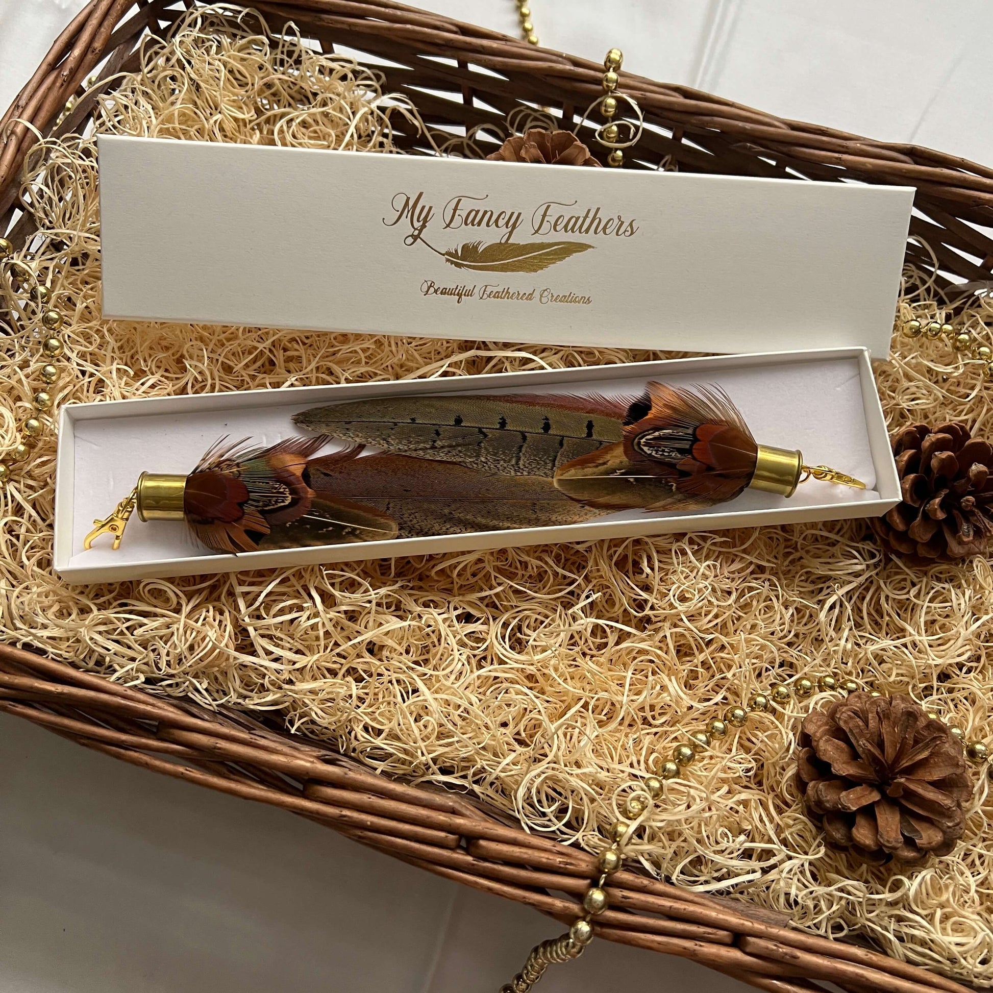 Feather boot tassels in a Christmas hamper