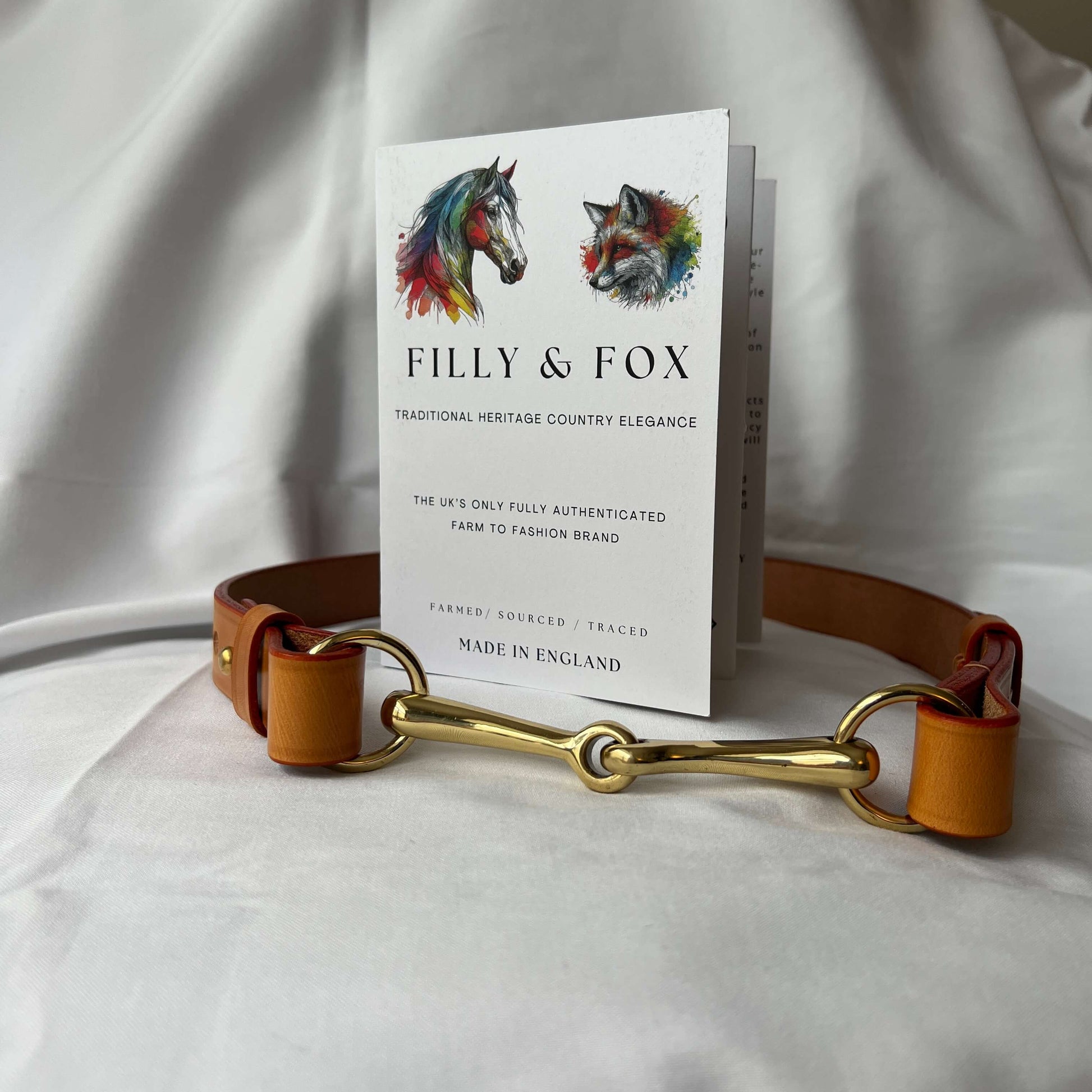 tan bridle leather belt with authentication paperwork