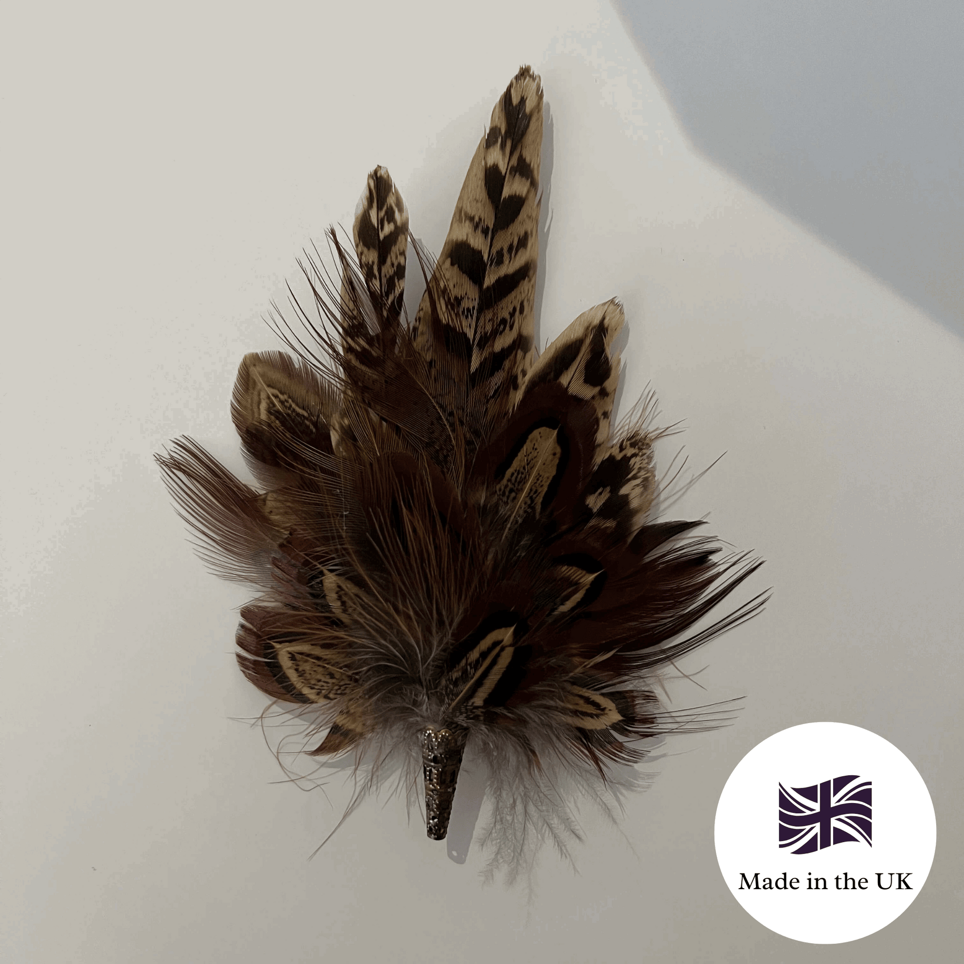 Feather brooch made in the uk by Fine Feathers Design