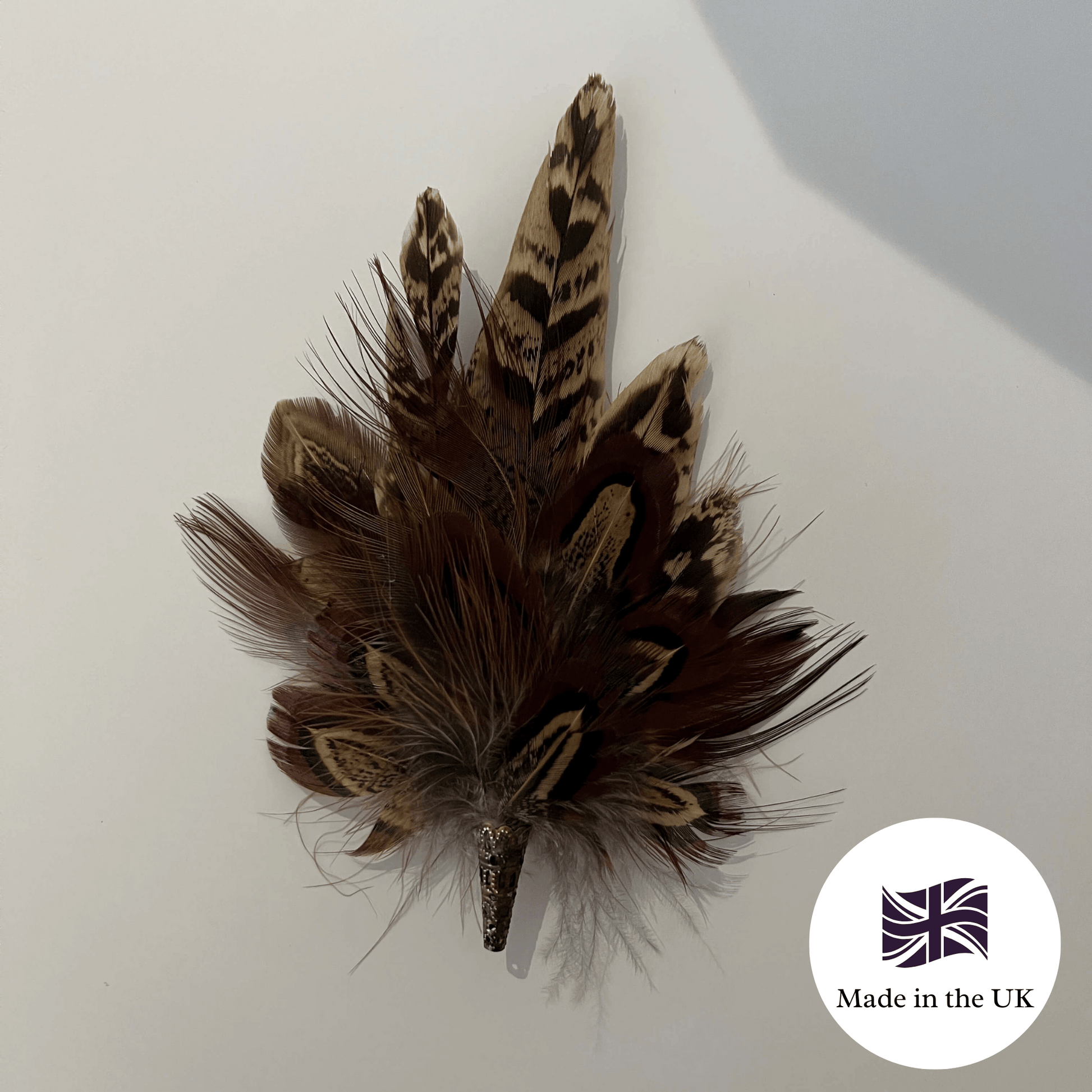 Feather brooch made in the uk by Fine Feathers Design