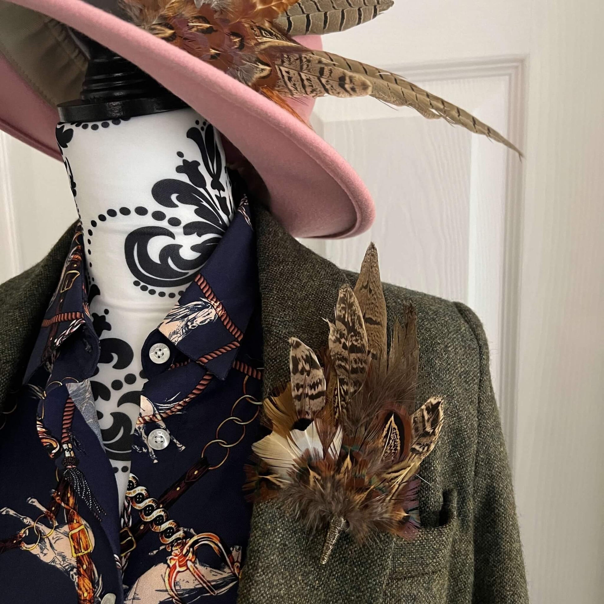 tweed country outfit featuring small feather brooch pin and large hat pin