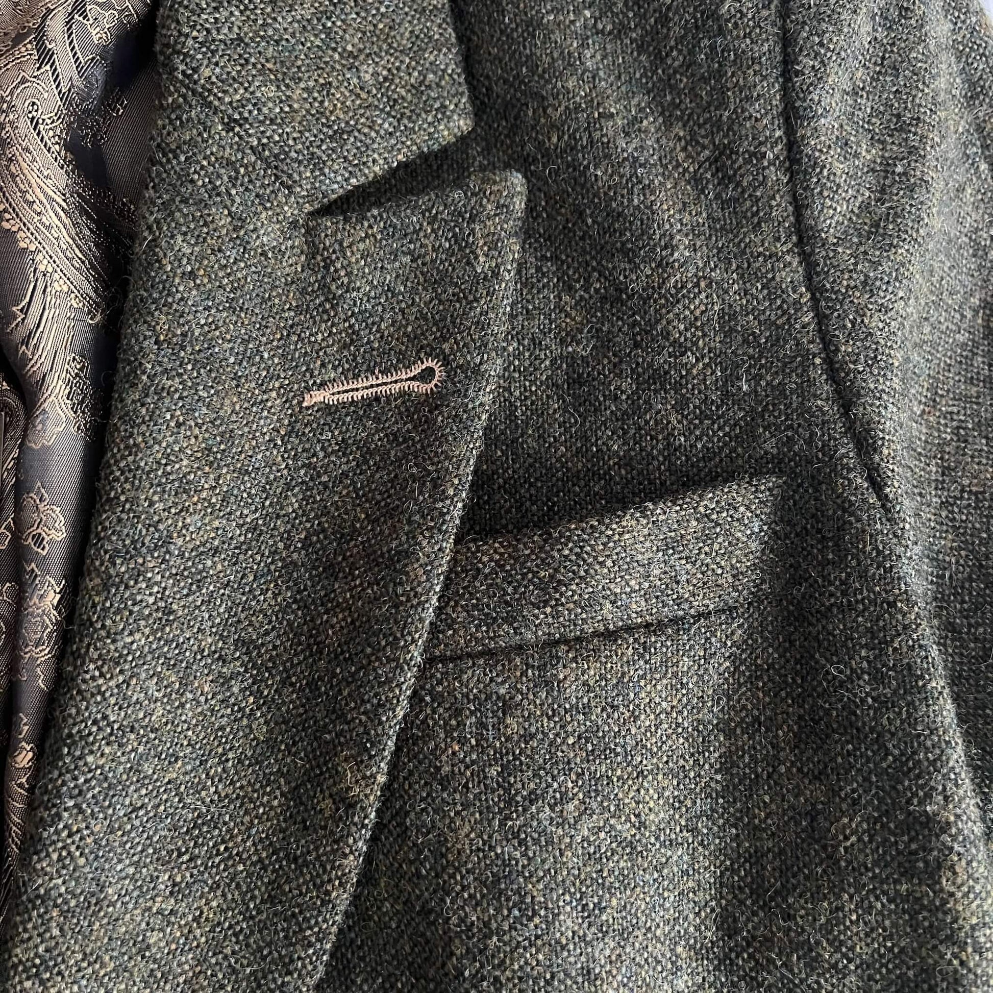close up of green tweed jacket lapel