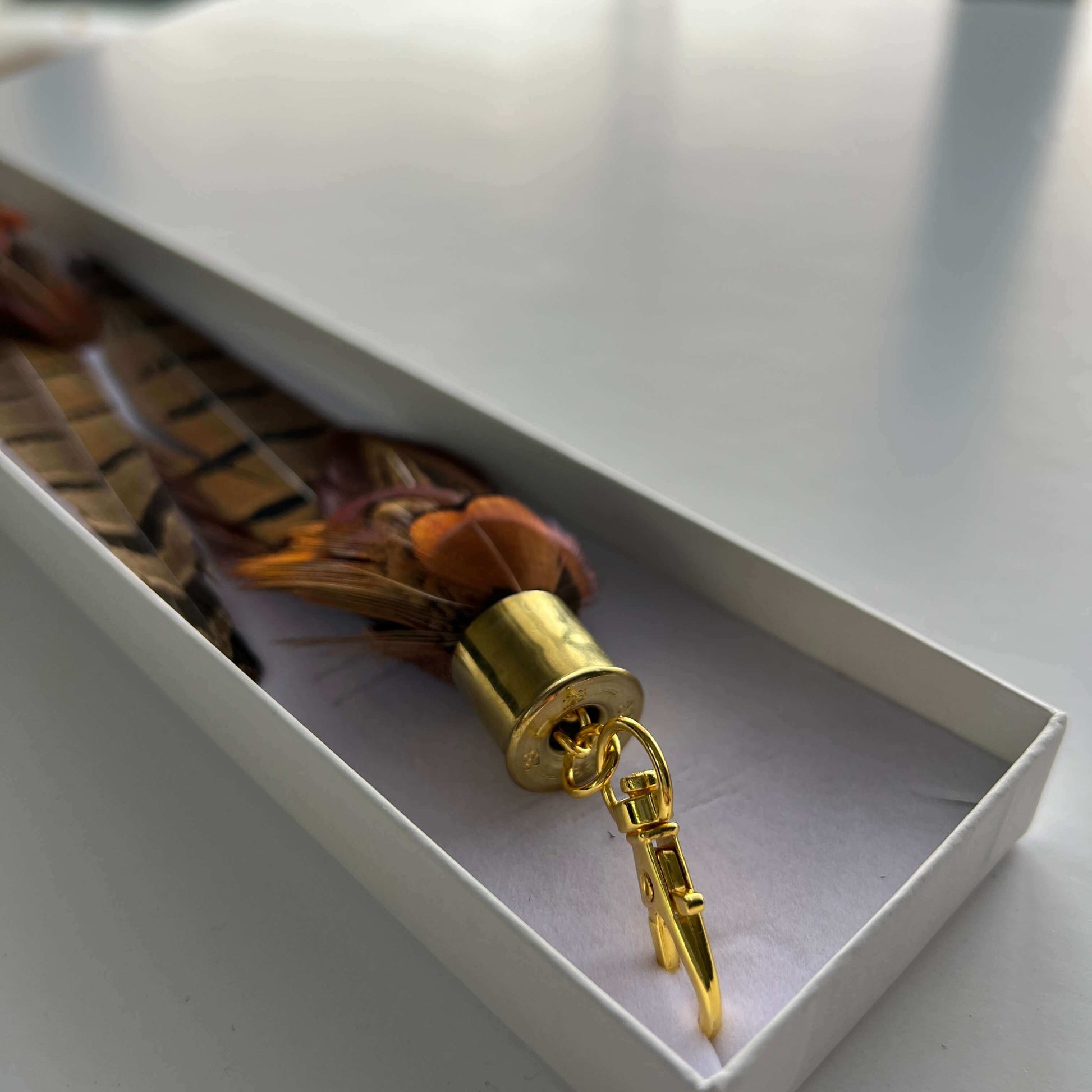 long brown feather boot tassels in gift box