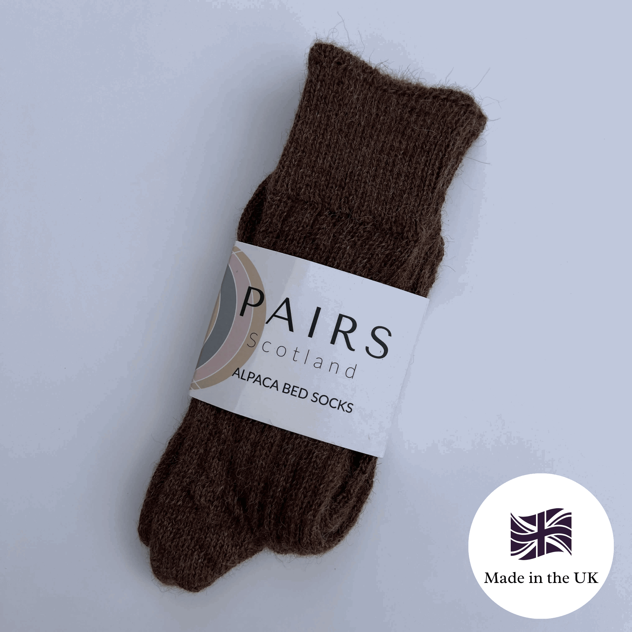 Brown alpaca bed socks with 'PAIRS Scotland' label