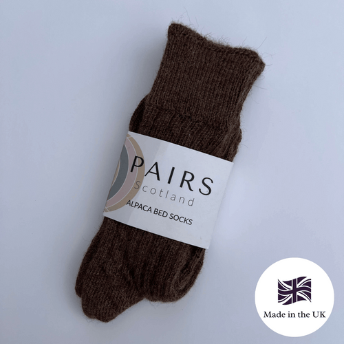 Brown alpaca bed socks with 'PAIRS Scotland' label