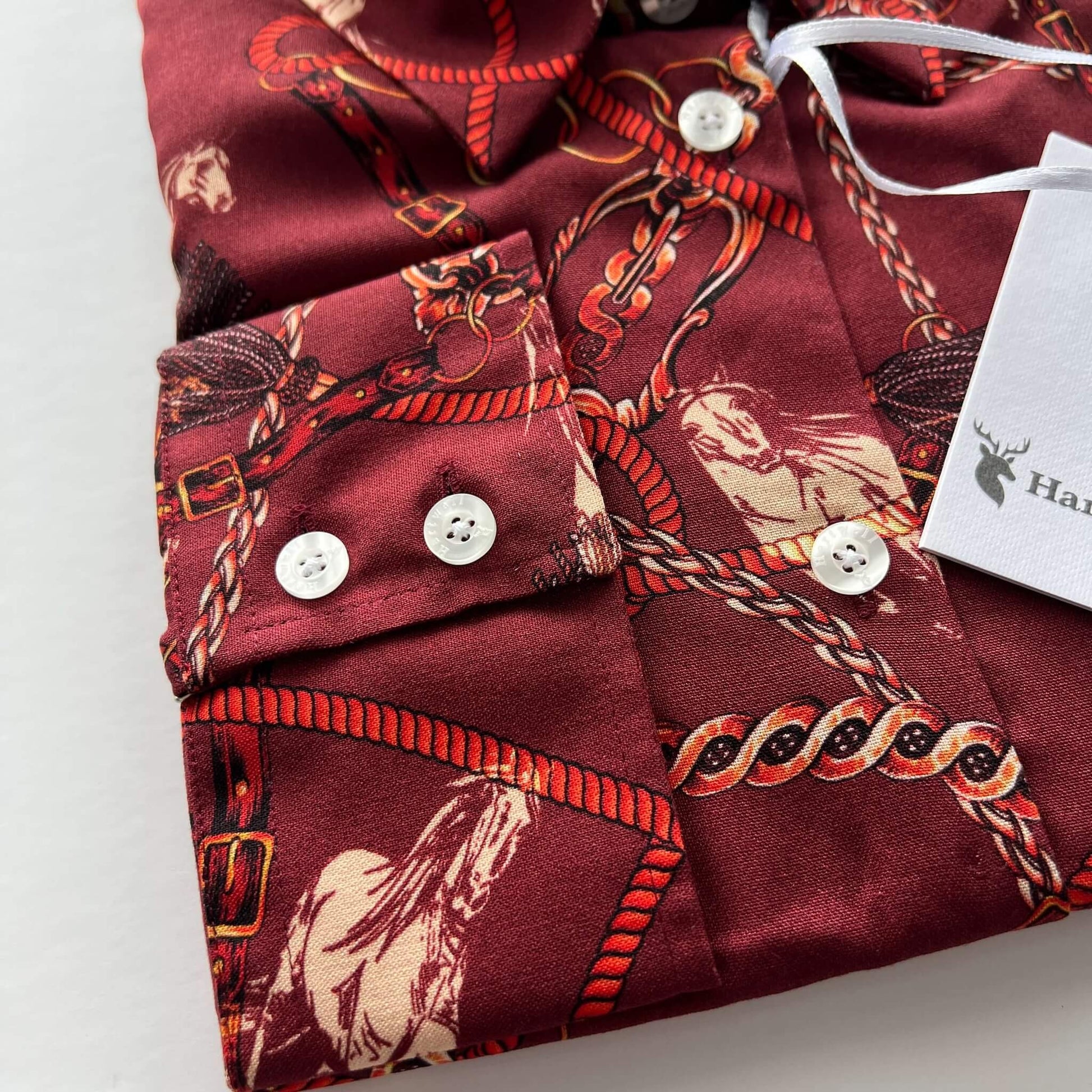red horse print shirt cuff detail