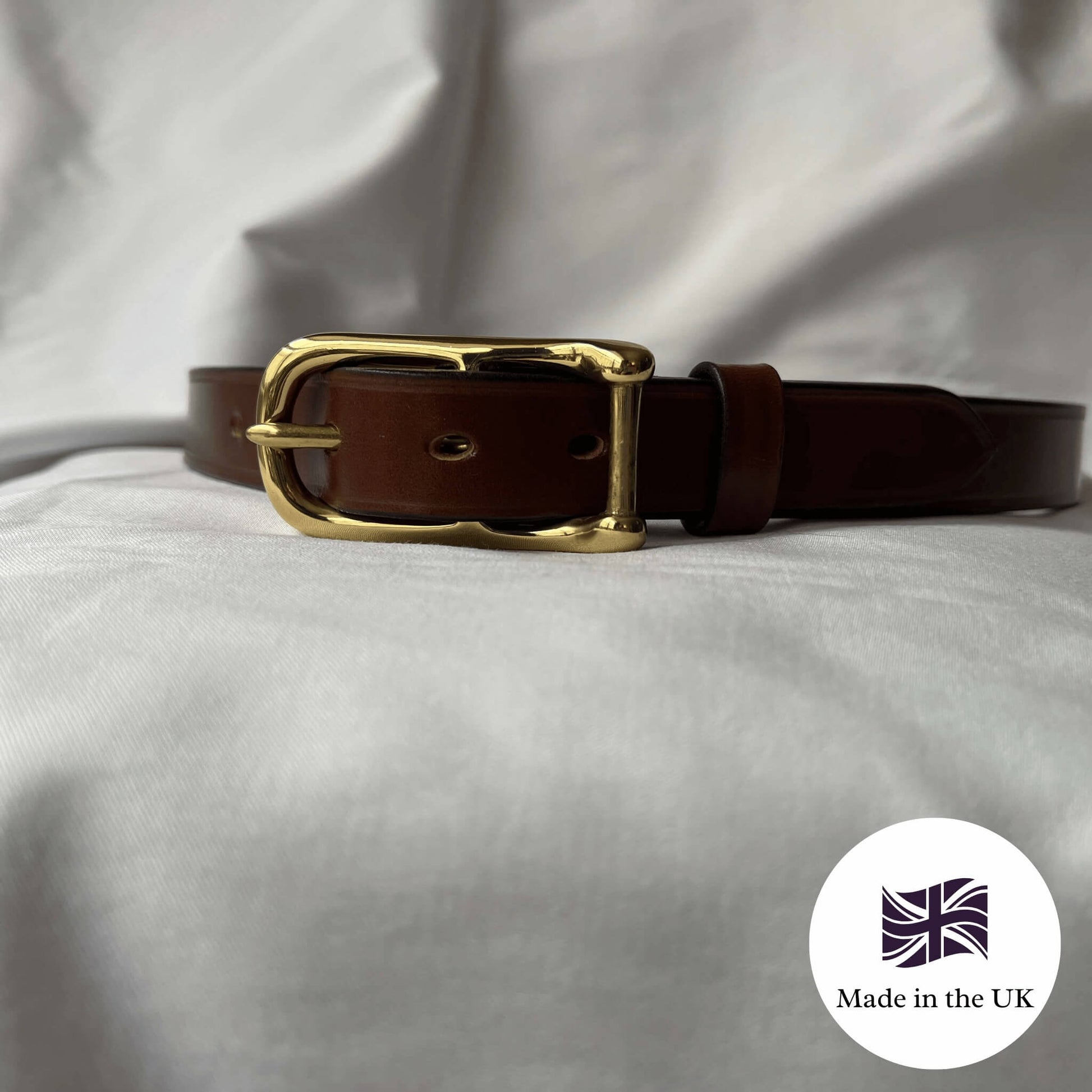 ladies' skinny leather belt in conker handmade in the uk with farm traced english bridle leather