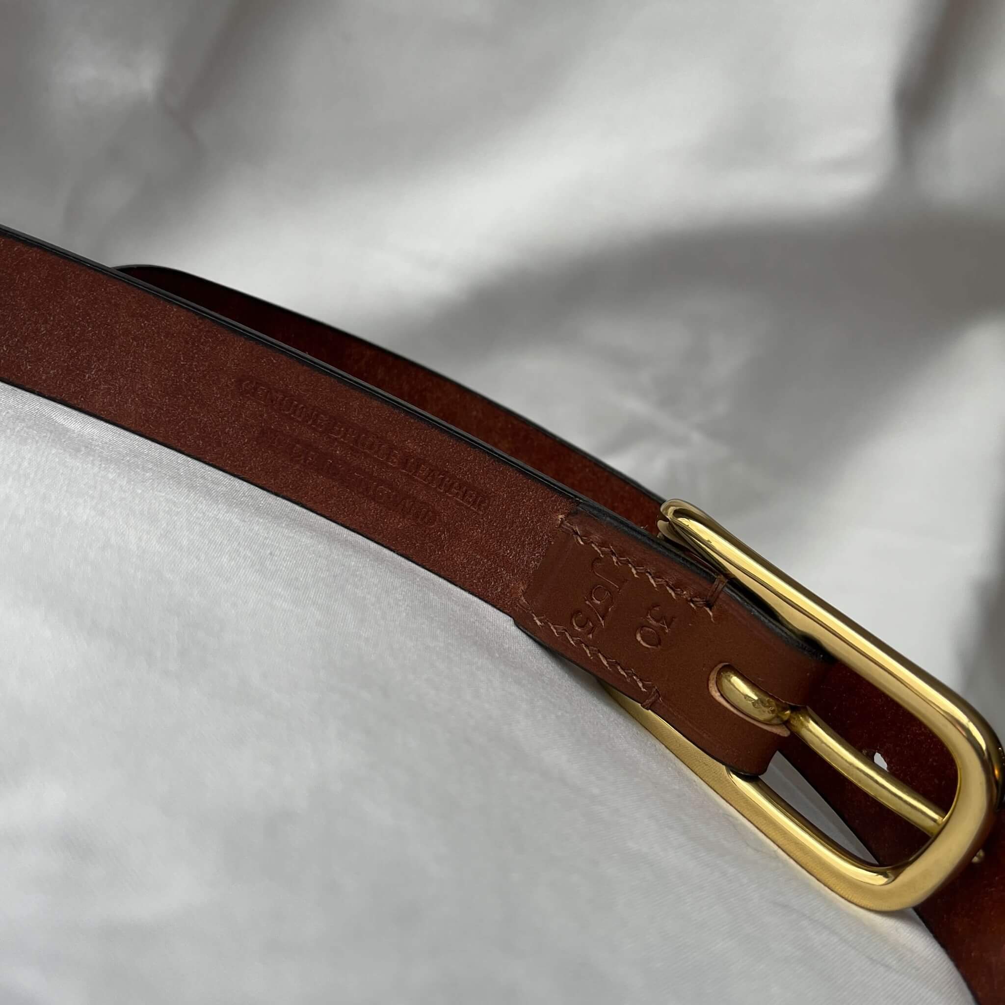 ladies' skinny leather belt showing provenance details