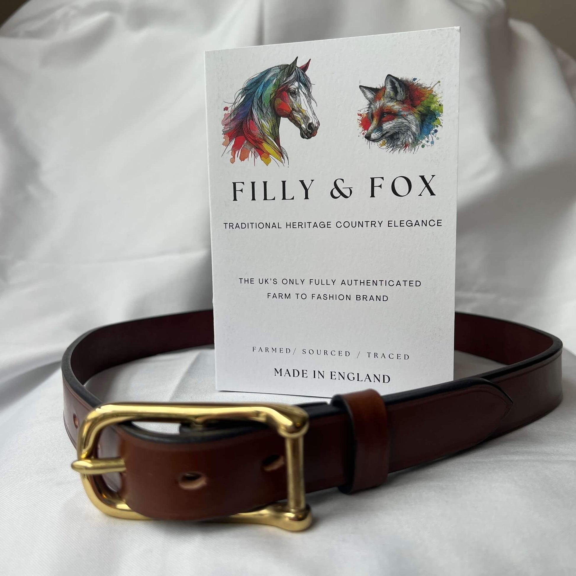 ladies' skinny leather belt in conker handmade in the uk with farm traced english bridle leather