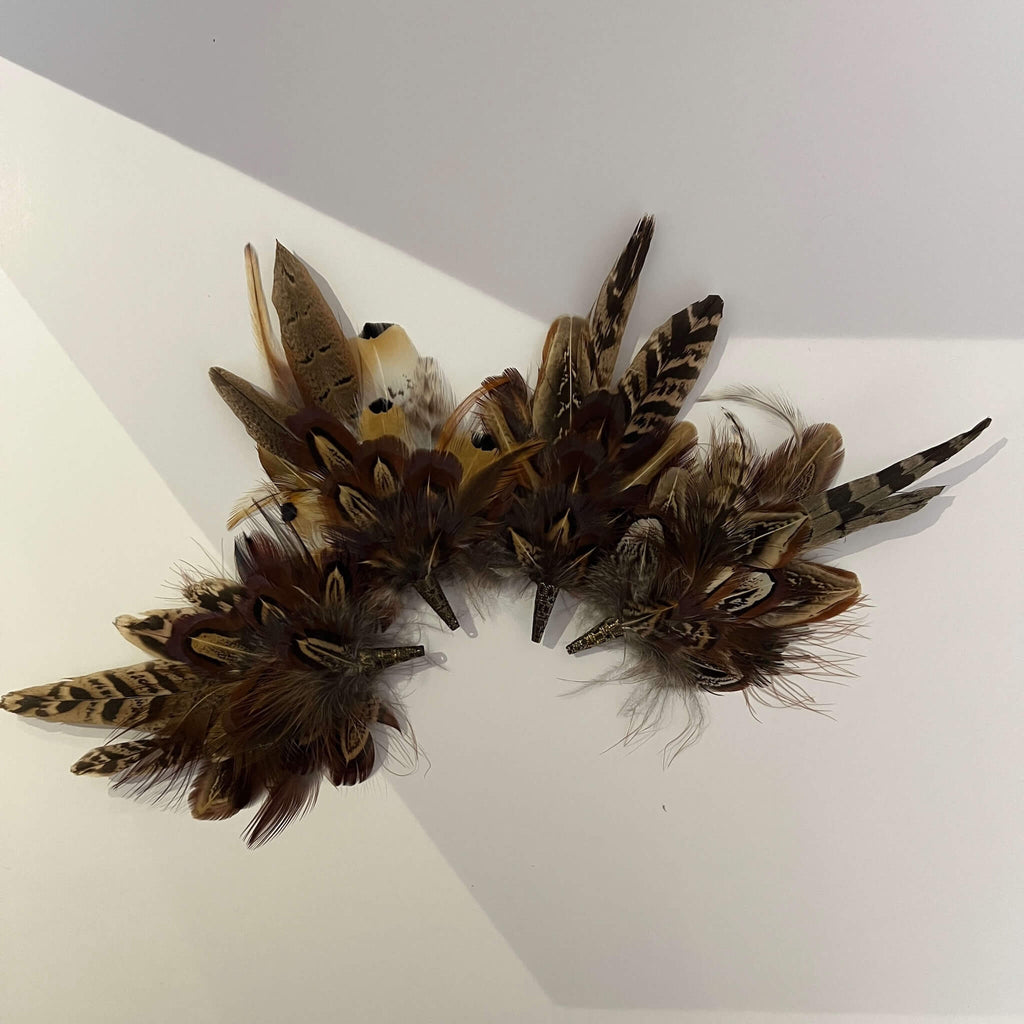 set of small feather brooch or hat pins